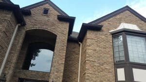 A well-kept home under a calm sky — reliable roofing work by GRT Roofing.