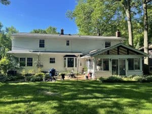 A home protected by new GRT Roofing gutter screens — safe from debris.