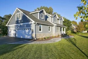 Completed exterior restoration — roofing, gutters, and siding by GRT Roofing.